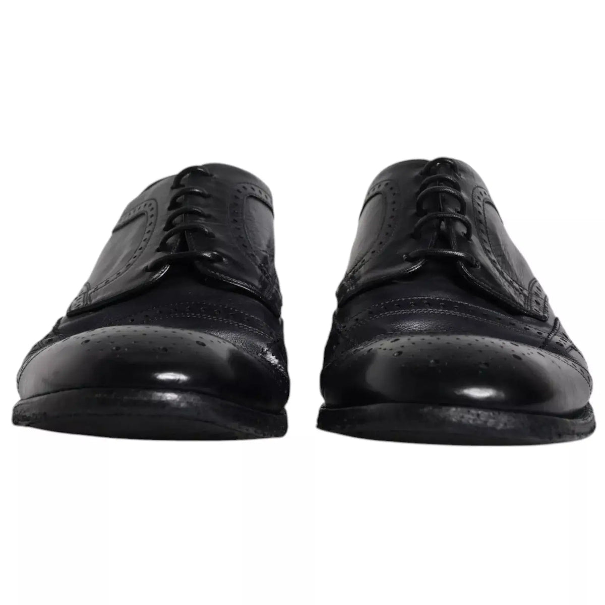 Dolce & gabbana chaussures derby wingtip en cuir bleu foncé avec détails perforés et finition polie pour usage formel