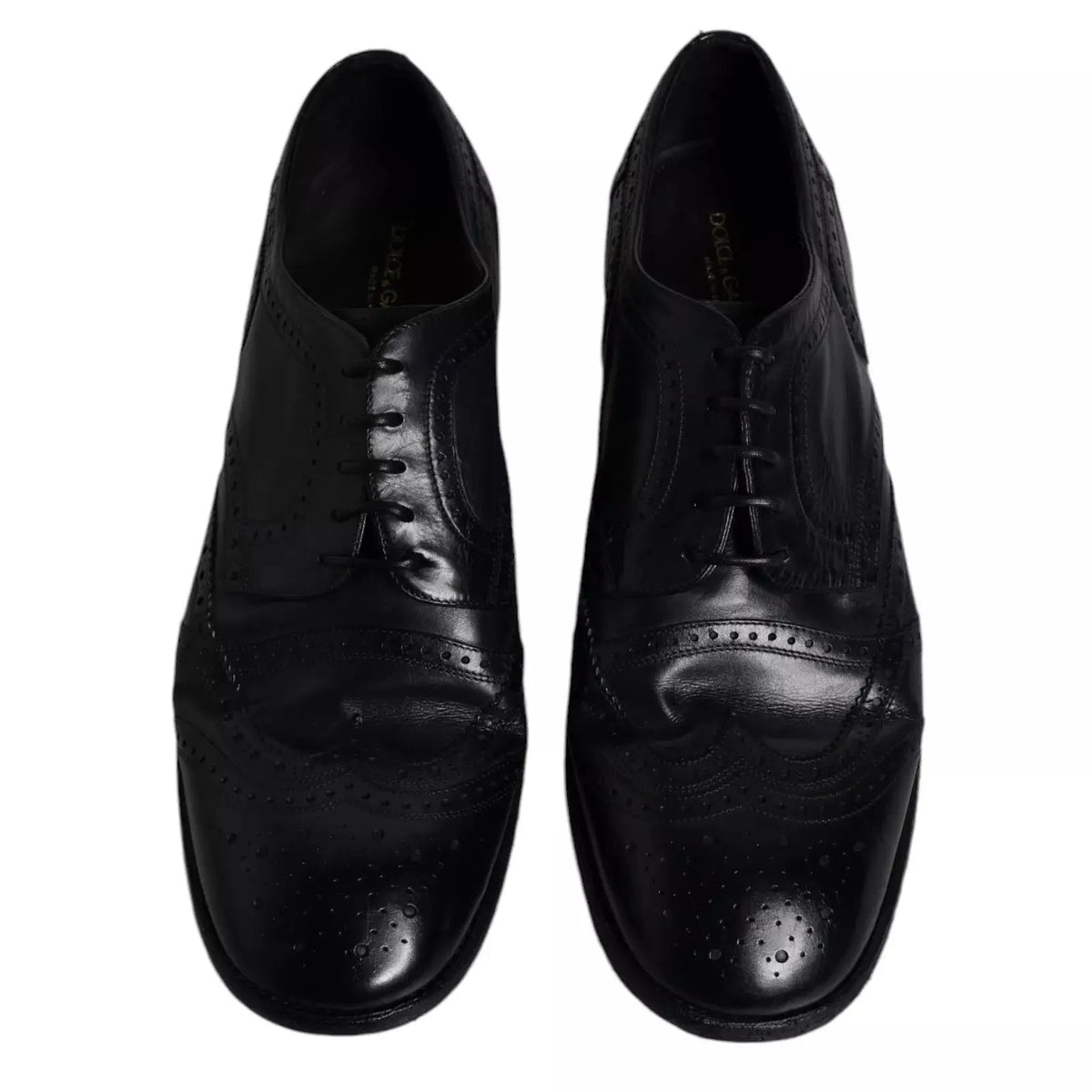 Chaussures derby wingtip formelles en cuir bleu foncé dolce & gabbana avec finition brillante et perforations