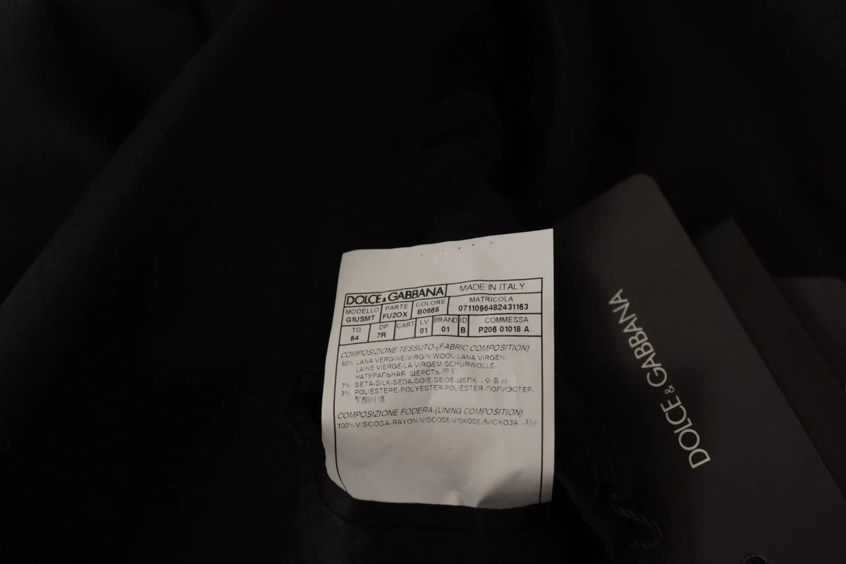 Étiquette noire dolce & gabbana avec texte blanc et logo sur blazer martini bleu foncé à simple boutonnage