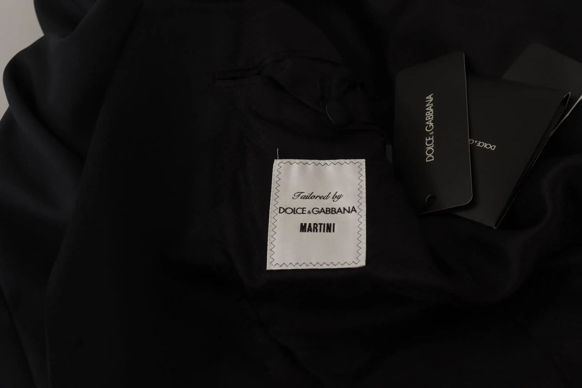 Étiquette noire dolce gabbana martini avec étiquette blanche et couture en zigzag sur blazer martini bleu foncé simple boutonnage