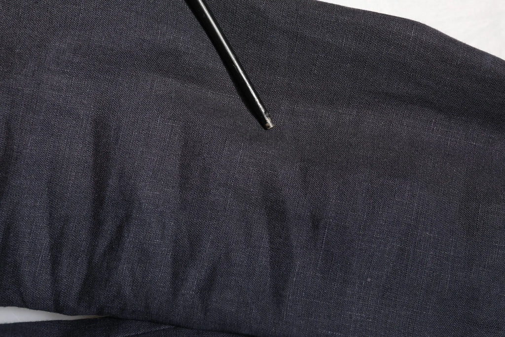 Tissu en denim bleu foncé avec texture tissée visible et légères plis pour blazer homme Dolce & Gabbana