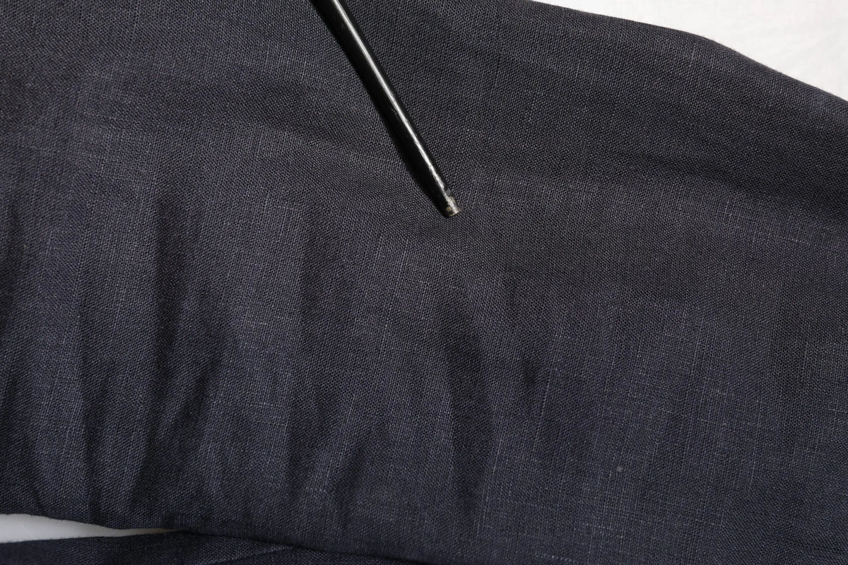 Tissu en denim bleu foncé avec texture tissée visible et légères plis pour blazer homme Dolce & Gabbana