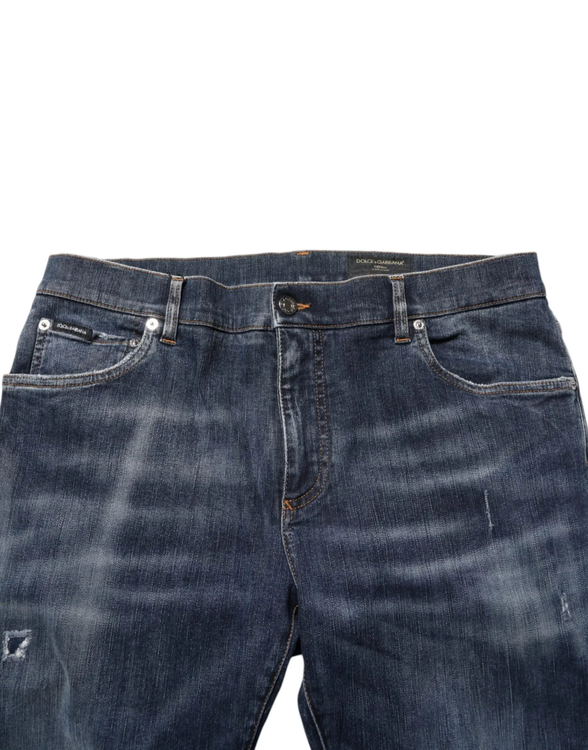 Dolce & Gabbana jean en denim bleu foncé avec effet délavé usé et détails subtils de moustaches