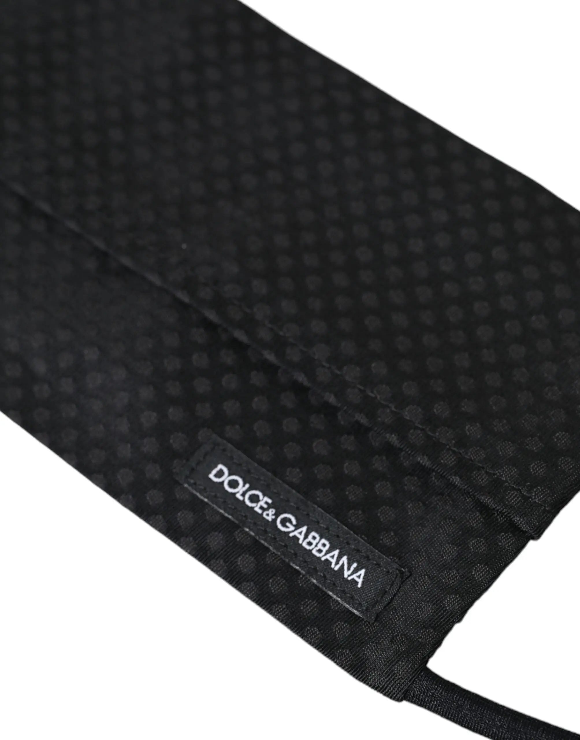 Masque facial dolce & gabbana noir en soie 100 ajustable avec texture subtilement pointillée