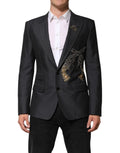 Dolce & Gabbana blazer en laine gris foncé avec broderie abeille et broderie pistolet dorée et argentée sur le côté gauche