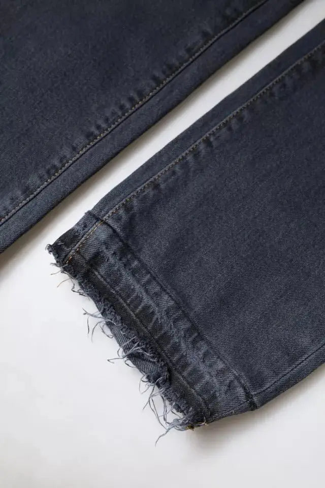 Jeans slim en denim coton gris foncé dolce & gabbana avec ourlet effiloché et coutures visibles