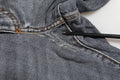 Veste en jean skinny stretch en coton gris foncé dolce gabbana avec couture marron et usure visible au niveau de la couture