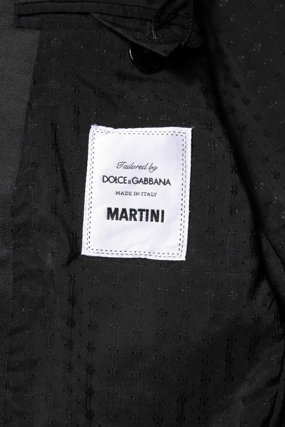 Manteau en tissu texturé noir avec étiquette tailleur par dolce & gabbana made in italy martini pour costume martini gris foncé