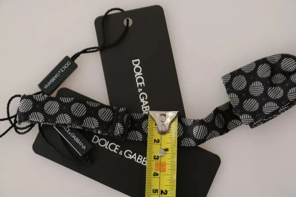 Dolce & gabbana nœud papillon en soie gris foncé à motif rayé circulaire noir et blanc pour homme