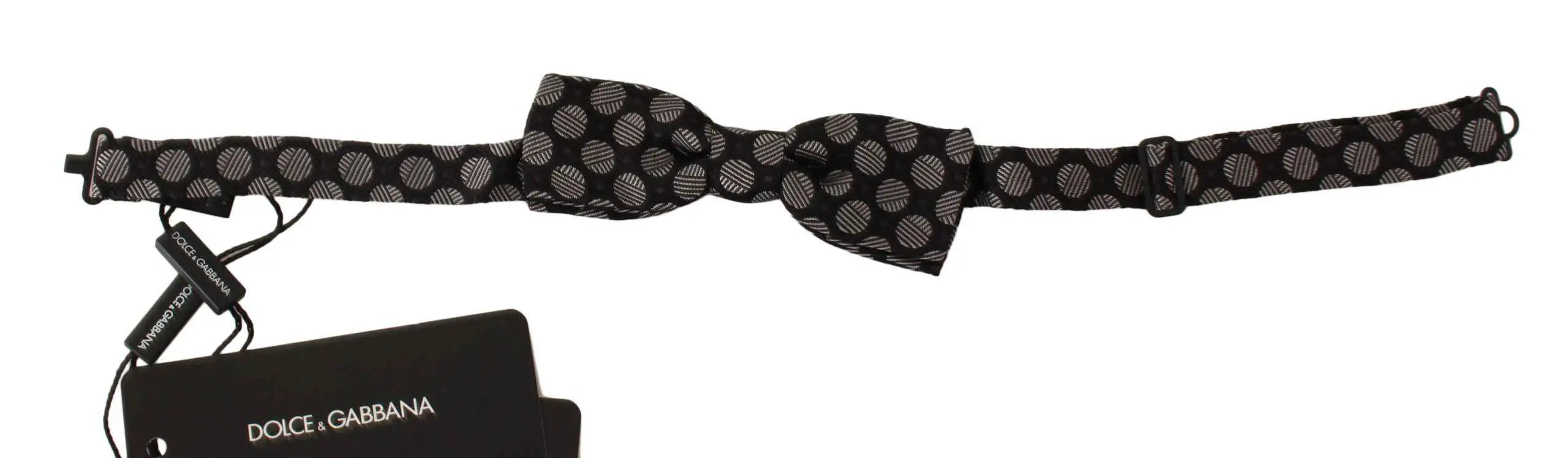 Noeud papillon homme en soie gris foncé dolce gabbana à motifs circulaires légers avec étiquette de marque