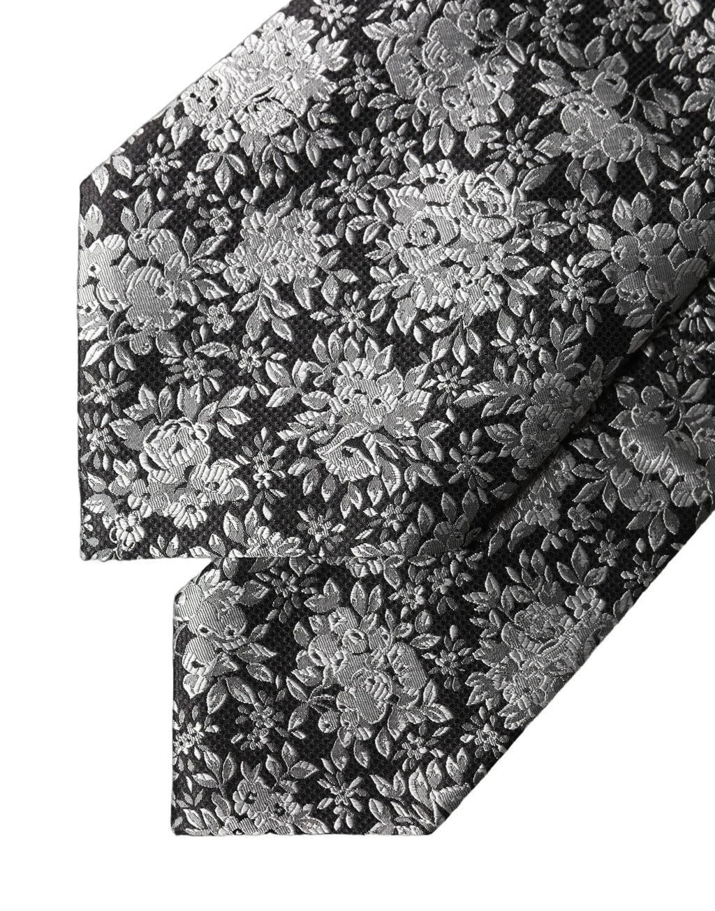 Une cravate femme ajustable dolce & gabbana en soie noire avec motif floral argenté détaillé et feuilles délicates