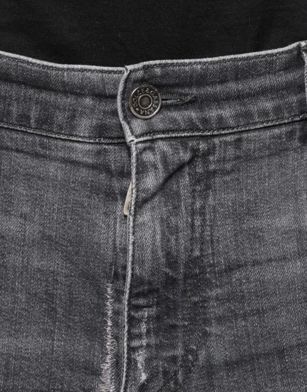 Jean skinny en denim gris foncé délavé avec ourlet effiloché et bouton métallique gravé dolce & gabbana