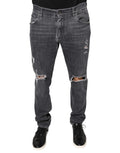 Jean slim en denim coton gris foncé distressed avec déchirures aux genoux dolce gabbana