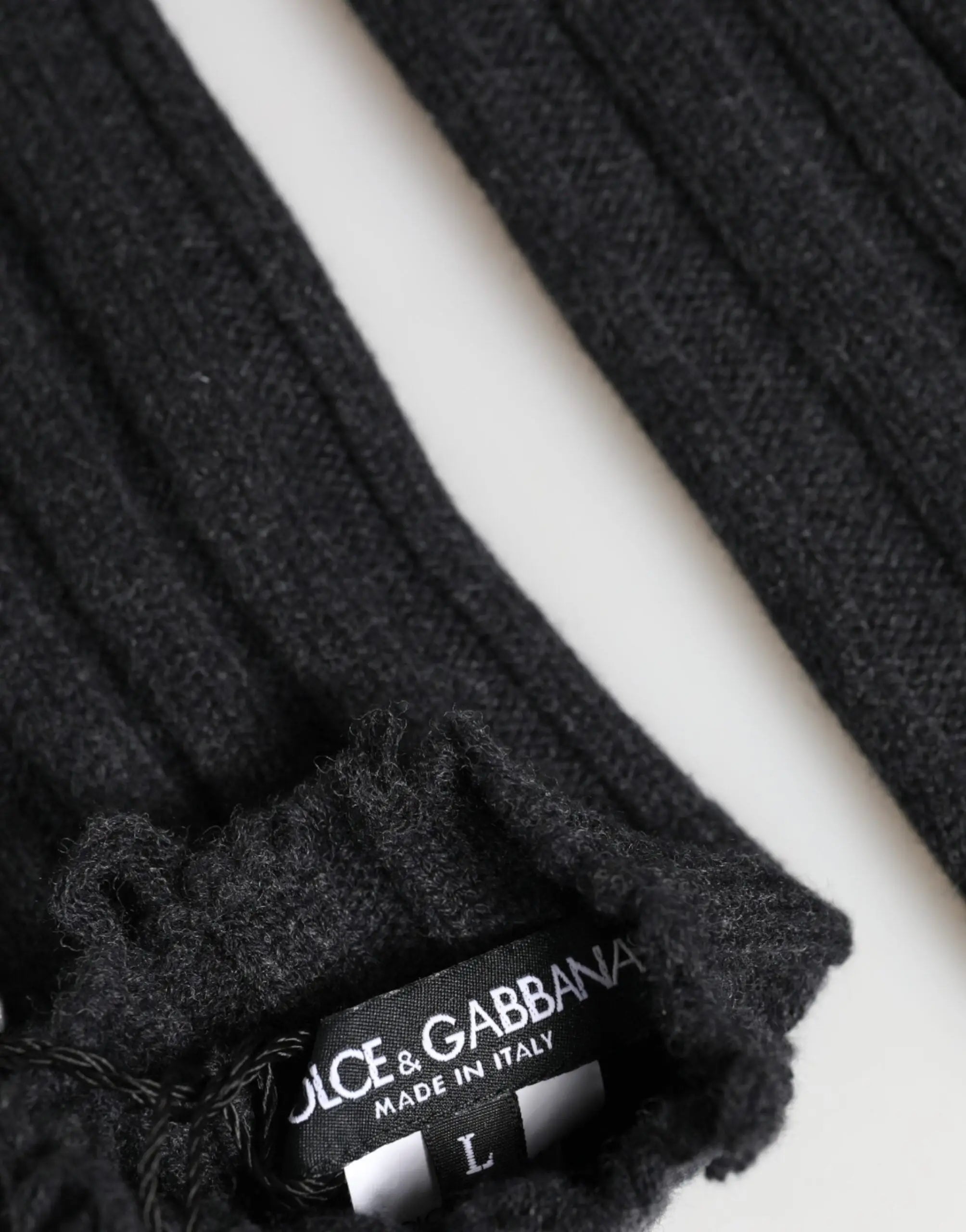 Gant sans doigts gris foncé en laine vierge de dolce & gabbana avec étiquette visible made in italy