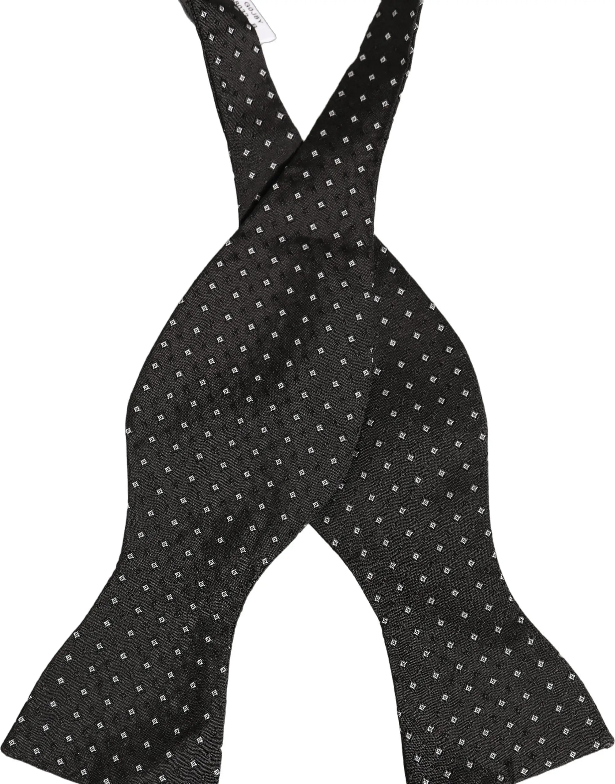 Noeud papillon dolce & gabbana en soie noire avec motif subtil de petits carrés blancs ajustable au cou