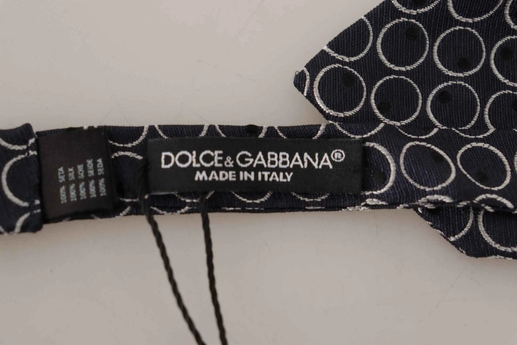 Cravate dolce & gabbana en soie 100 pour cent gris foncé avec motif de cercles concentriques blancs
