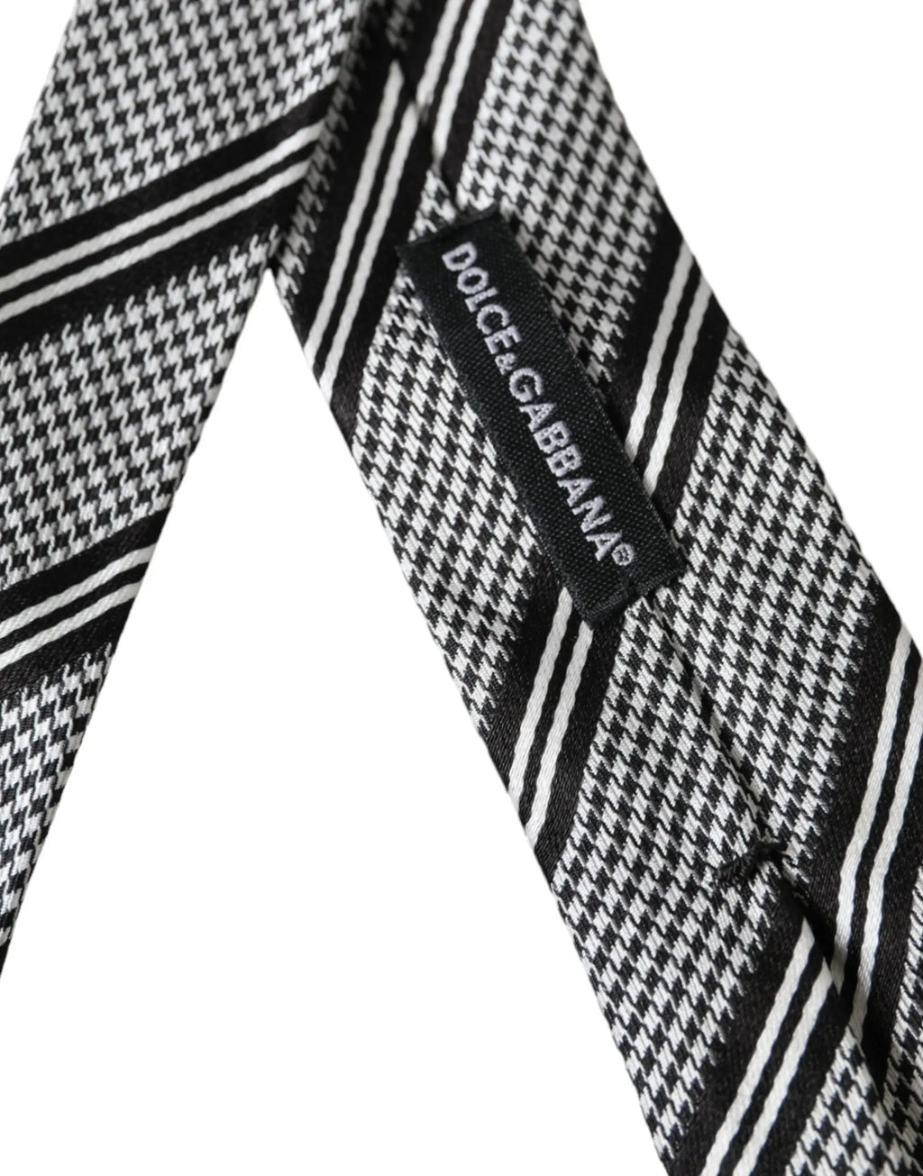 Cravate dolce & gabbana en soie ajustable gris foncé à rayures blanches motif pied-de-poule noir et blanc