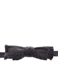 Dark gray dolce & gabbana wool silk bow tie with subtle damask pattern and frayed edges for men