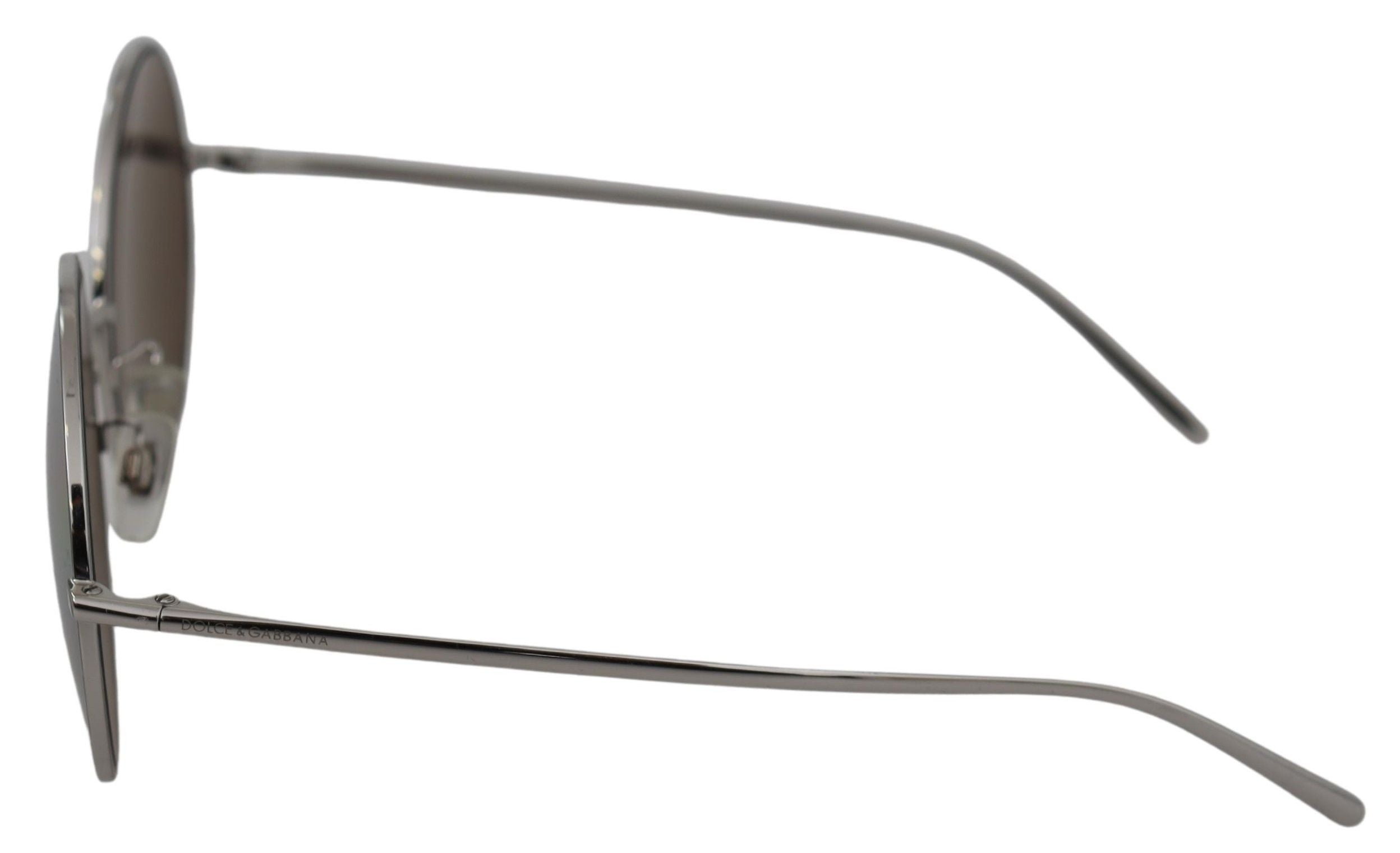 Lunettes de soleil rondes gris argenté pour femmes Dolce & Gabbana, monture en métal argenté, design élégant et moderne.