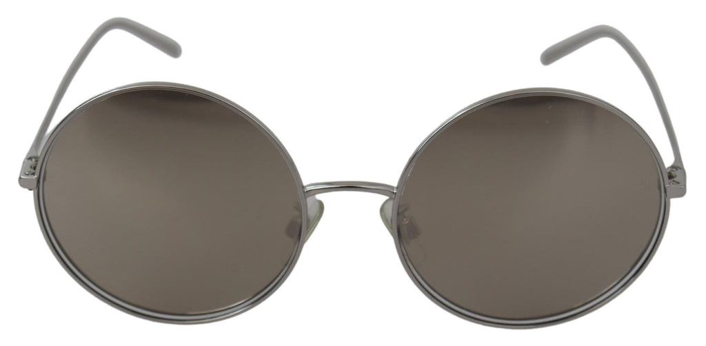 Lunettes de soleil rondes pour femmes Dolce & Gabbana en argenté avec verres gris, style élégant et moderne.