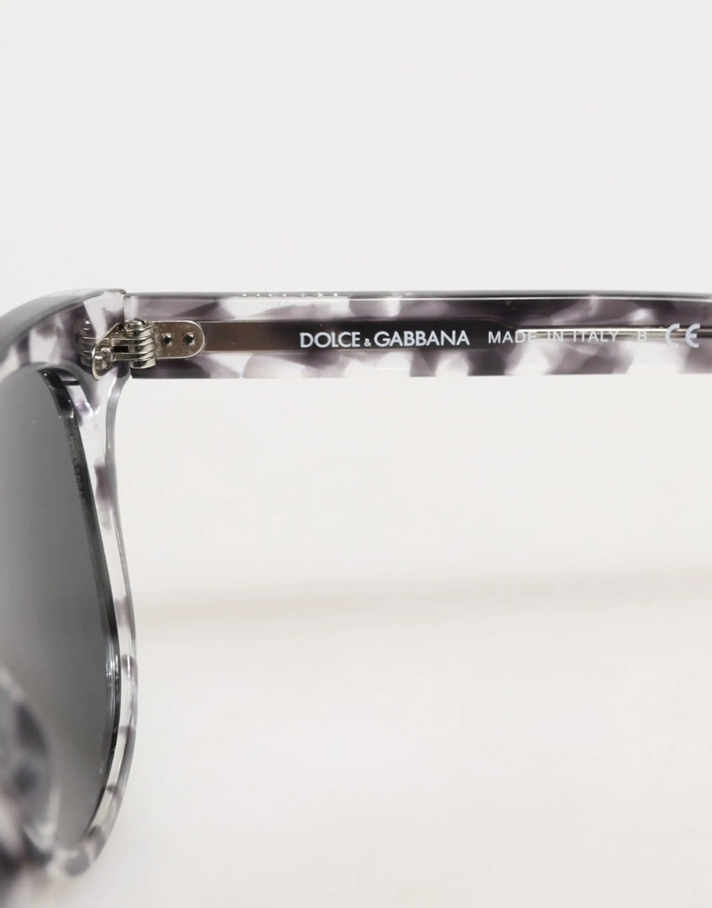 Lunettes de soleil dolce & gabbana dg4254 havana cadre marbré noir et blanc avec verres teintés gris foncé