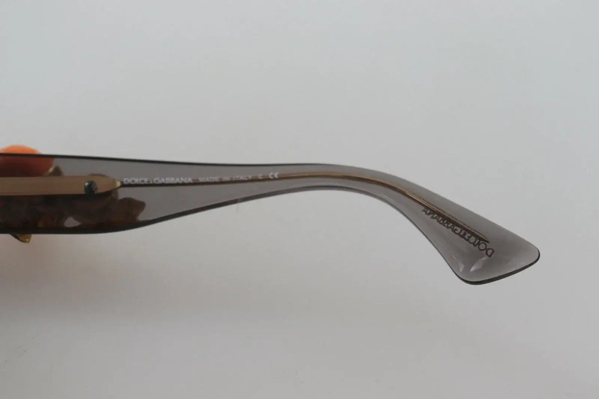 Image du côté intérieur des lunettes de soleil dolce & gabbana dg4283b en acétate brun translucide avec logos gravés made in italy
