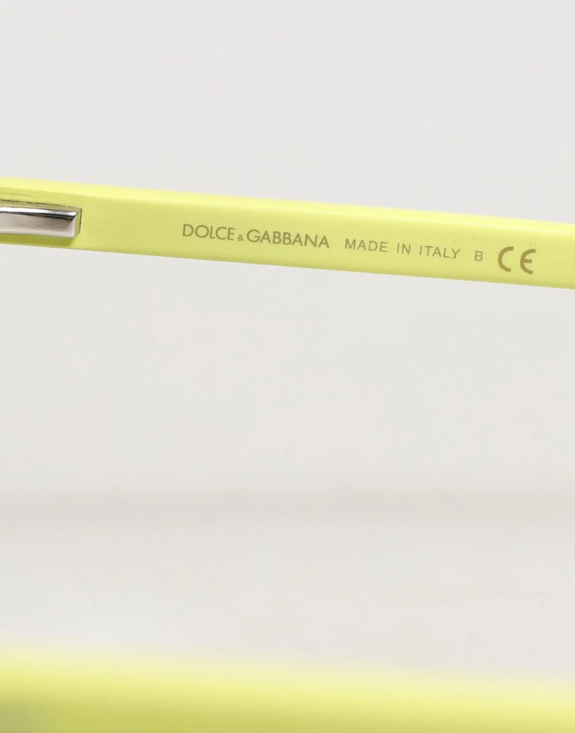 Lunettes de soleil dolce & gabbana dg4324 cadre jaune brillant avec branches métalliques gravées et verres miroir