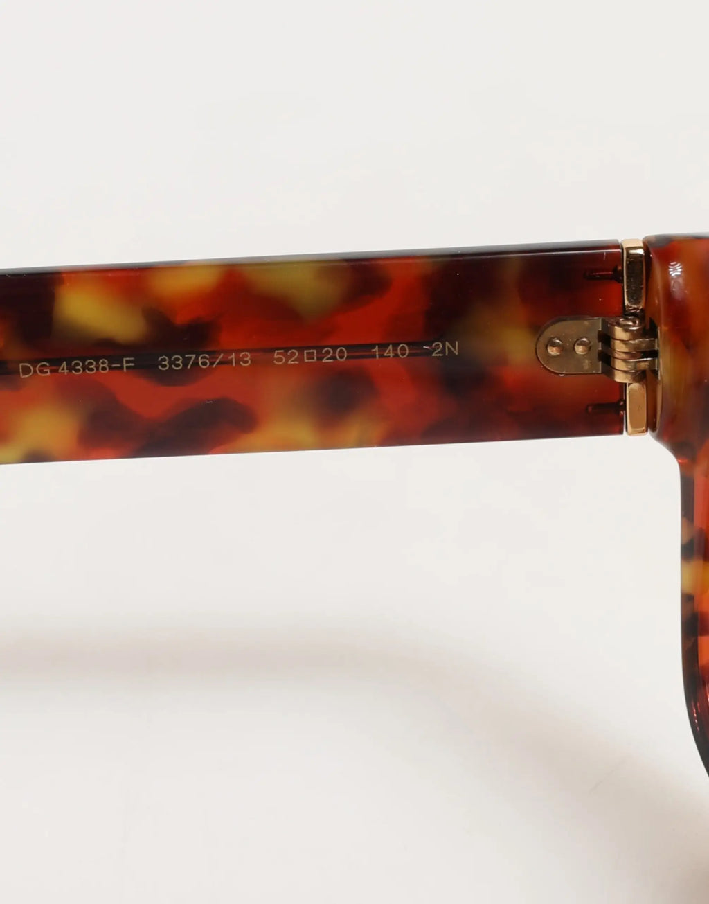 Lunettes de soleil dolce & gabbana dg4338f en acétate havane avec charnière métal doré et monture ronde complète