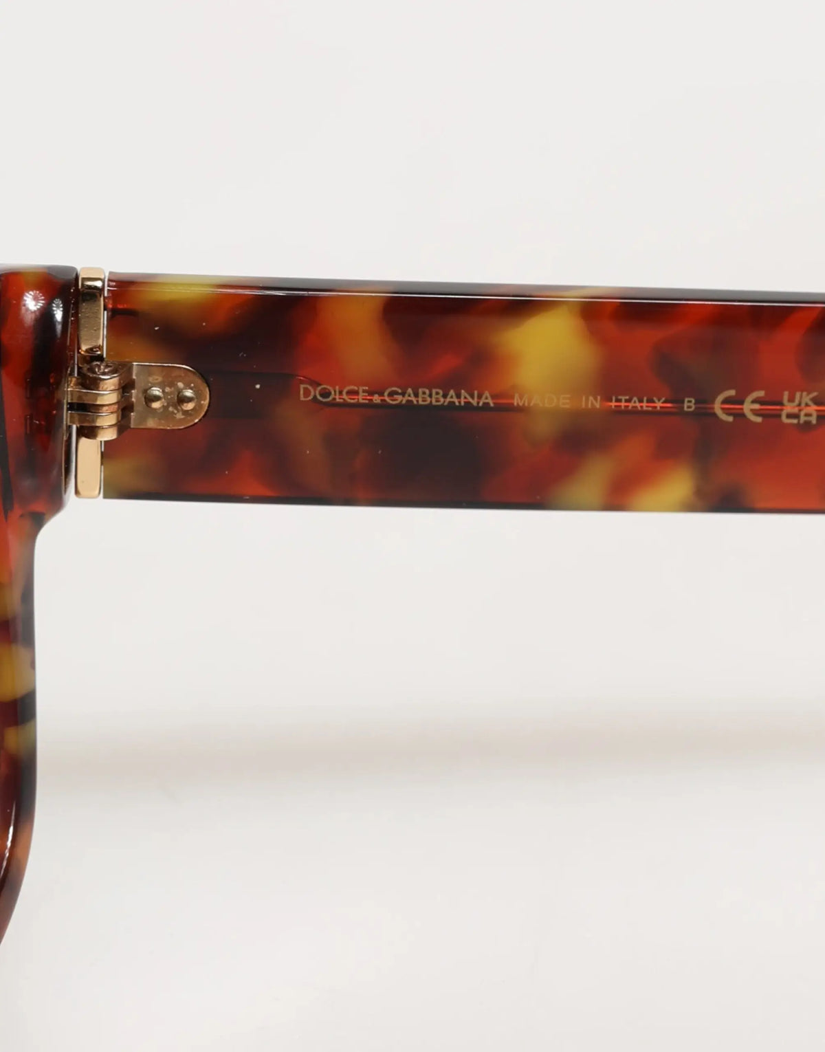 Lunettes de soleil dolce & gabbana dg4338f monture ronde en acétate havane avec charnière en métal doré