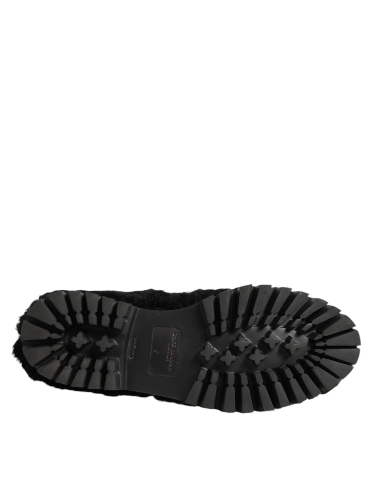 Semelle extérieure noire en caoutchouc avec rainures profondes et dessus en fourrure noire douce dolce gabbana slippers