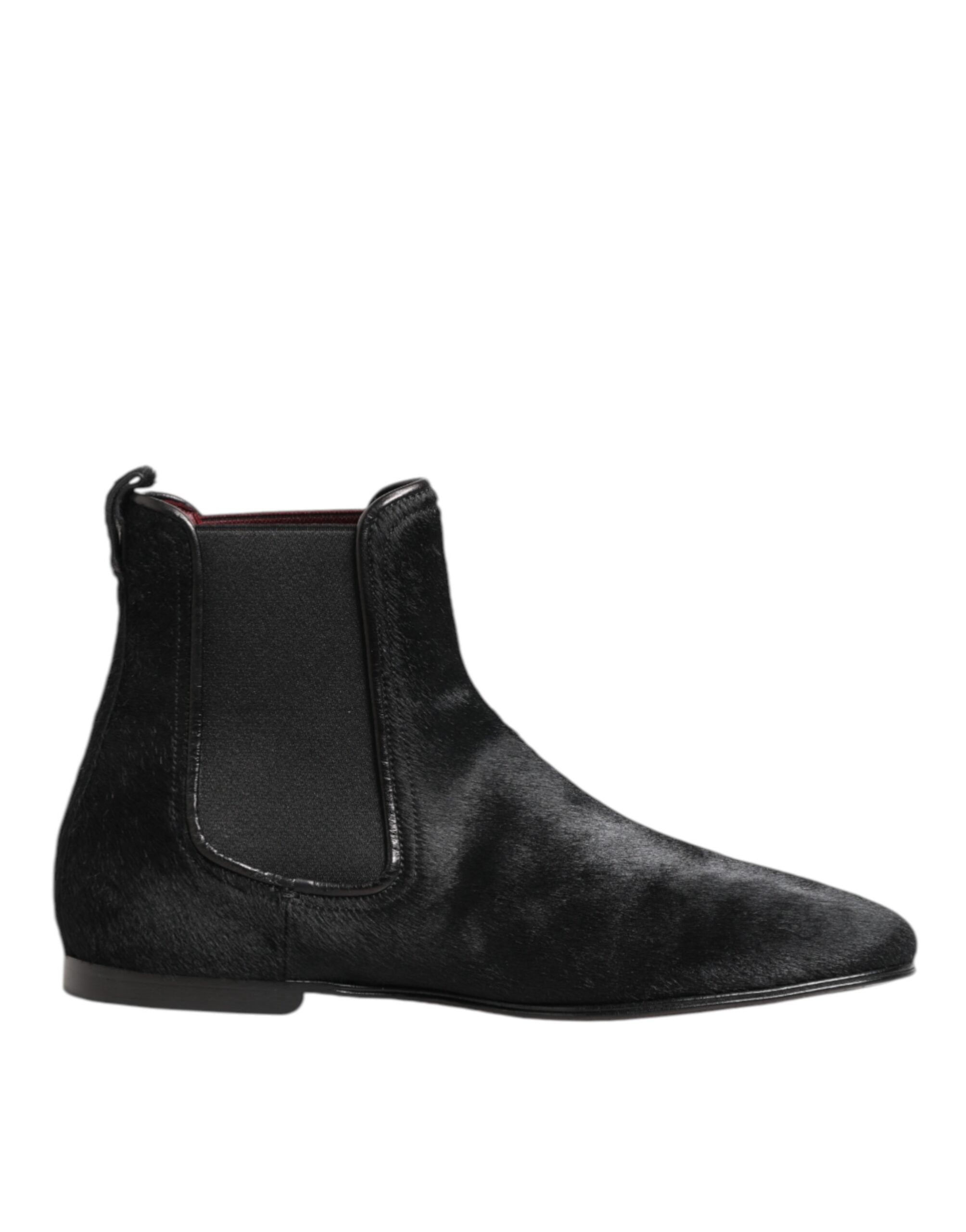 Bottes Chelsea en cuir noir avec fourrure pour homme de Dolce & Gabbana, vue de profil.