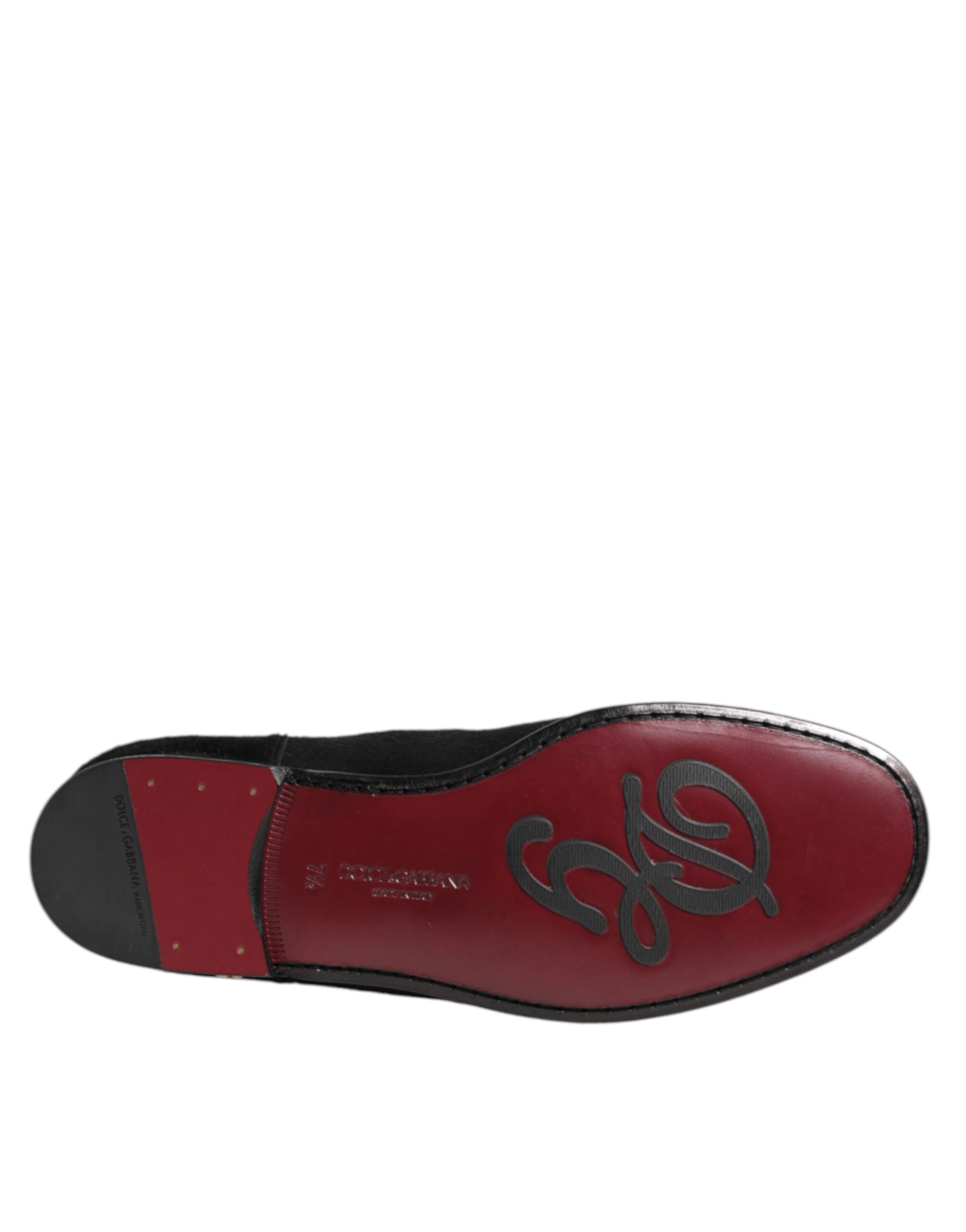 Chaussures Chelsea en cuir noir avec fourrure pour homme de Dolce & Gabbana, bottines élégantes et modernes.