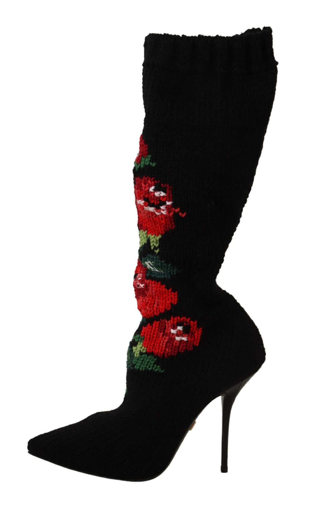 Chaussettes noires extensibles Dolce & Gabbana avec motifs de roses rouges, portées avec des bottines élégantes.