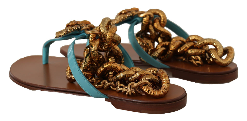Sandales plates en cuir bleu Dolce & Gabbana Devotion, élégantes et confortables, visibles en image.