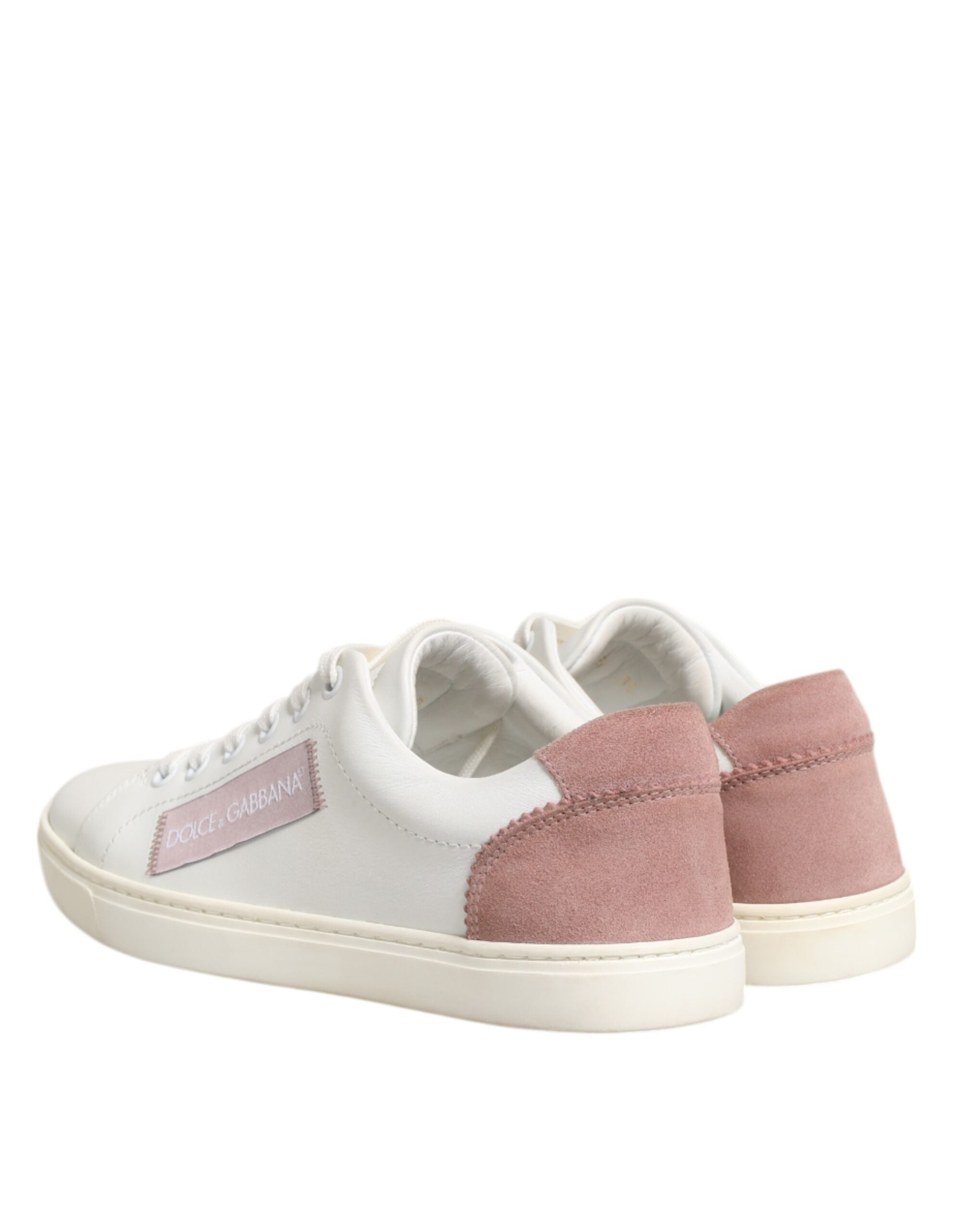 Chaussures Dolce & Gabbana sneakers basses en cuir blanc et rose, vue de face, détails de la semelle et des lacets.