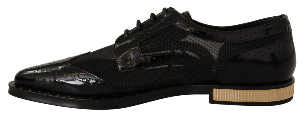 Chaussures wingtip en cuir noir de Dolce & Gabbana, brogue transparent, style élégant et sophistiqué.