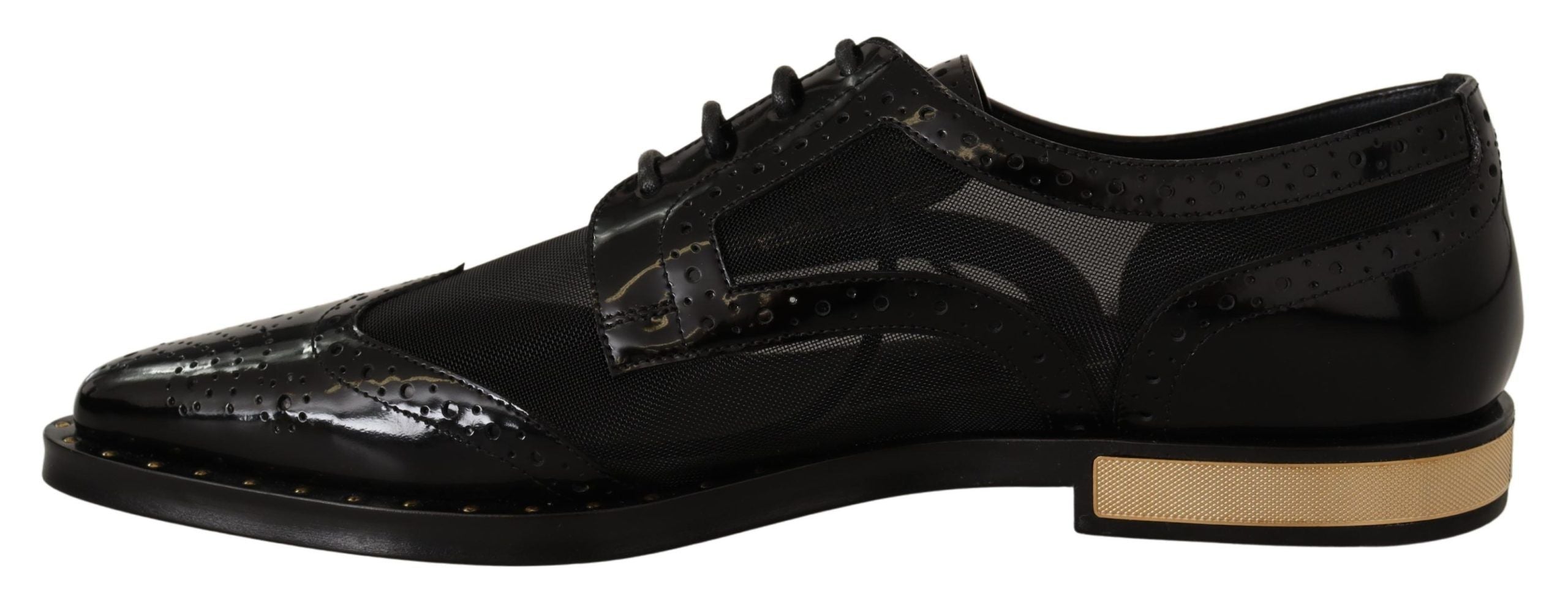 Chaussures wingtip en cuir noir de Dolce & Gabbana, brogue transparent, style élégant et sophistiqué.