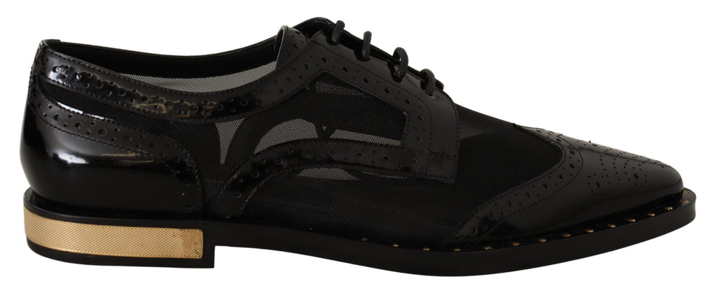 Chaussures wingtip en cuir noir Dolce & Gabbana, élégantes et transparentes, pour femme, vue de profil.