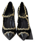 Chaussures Dolce & Gabbana Mary Janes en velours noir avec détails dorés, semelle en cuir et design élégant.