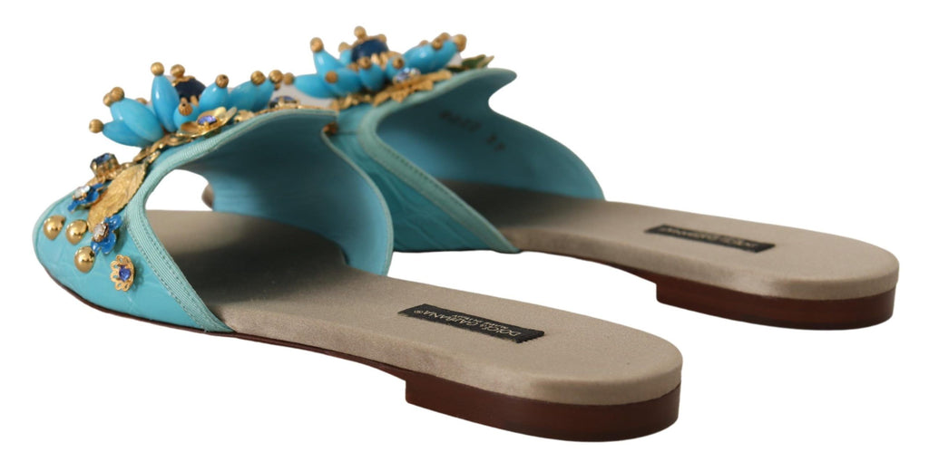 Sandales en cuir exotique bleu avec cristaux Dolce & Gabbana, style élégant et luxueux, visibles en gros plan.