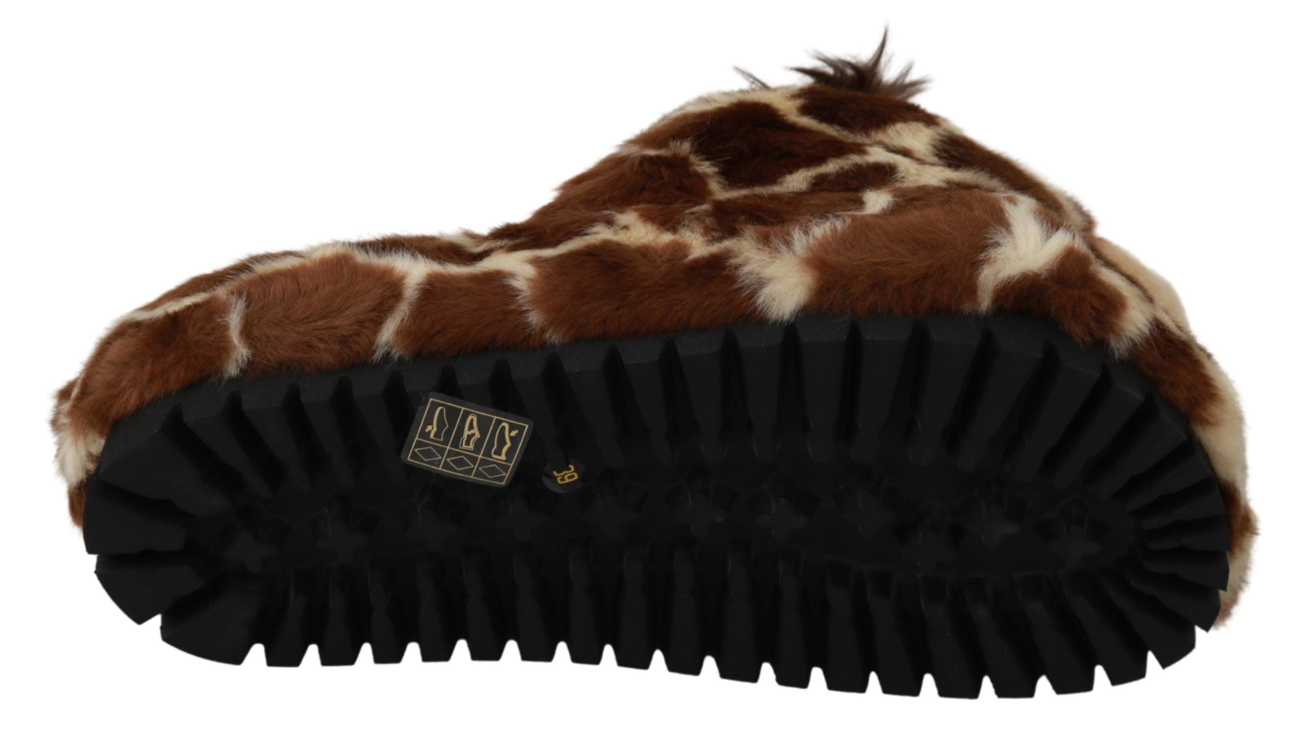 Chaussures Dolce & Gabbana, slippers plates marron à motif girafe, confortables et élégantes, en cuir souple.
