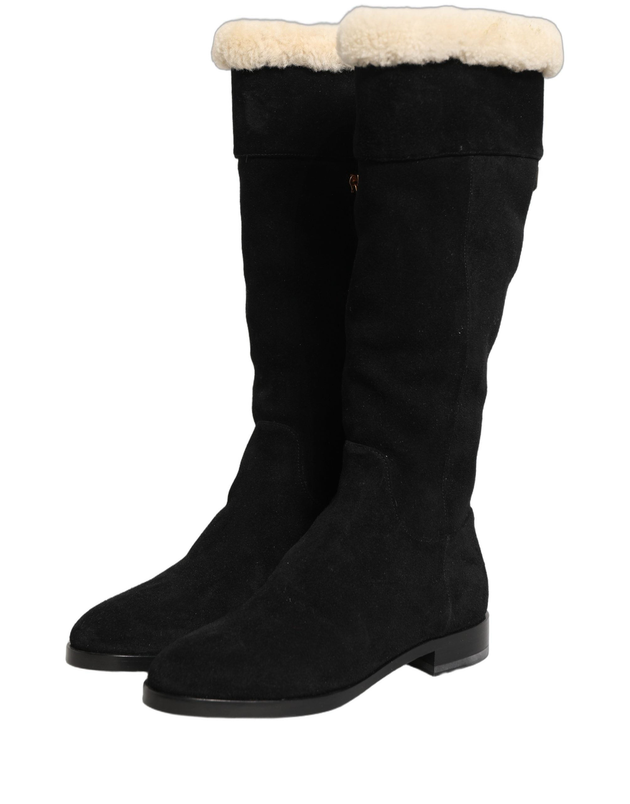 Bottes hautes en cuir suédé noir de Dolce & Gabbana, style élégant et sophistiqué, visibles en détail.