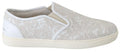 Chaussures mocassins en cuir blanc Dolce & Gabbana, sans lacets, style slip-on, élégantes et sophistiquées.