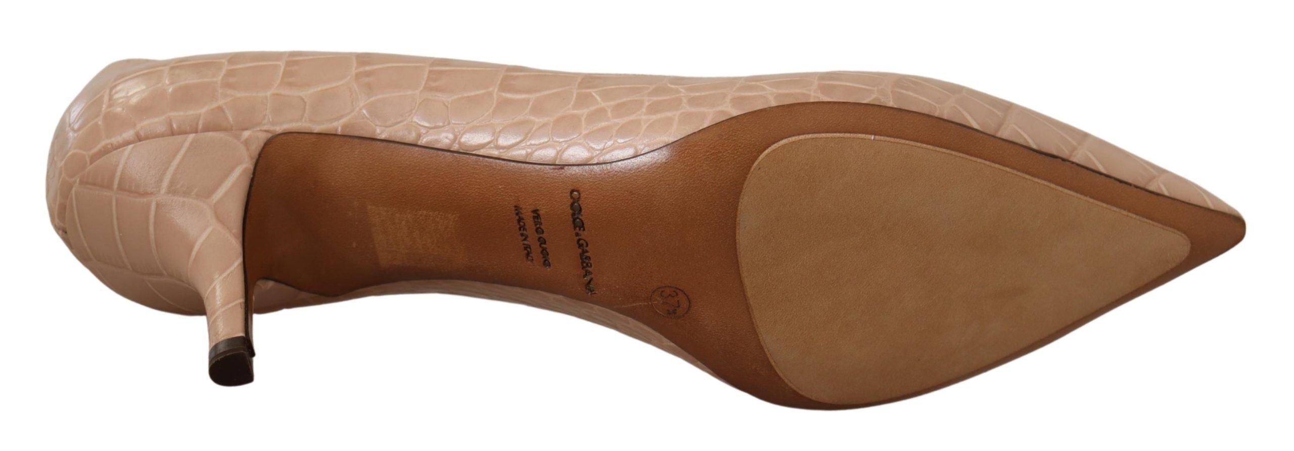 Chaussures à talons pointus en cuir beige de Dolce & Gabbana, élégantes et sophistiquées.