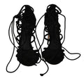 Sandales stilettos en daim noir Dolce & Gabbana avec bride élégante et talons fins, parfaites pour une tenue sophistiquée.
