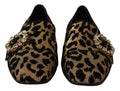 Chaussures loafers Dolce & Gabbana en or avec imprimé léopard et cristaux, finition élégante et luxueuse.