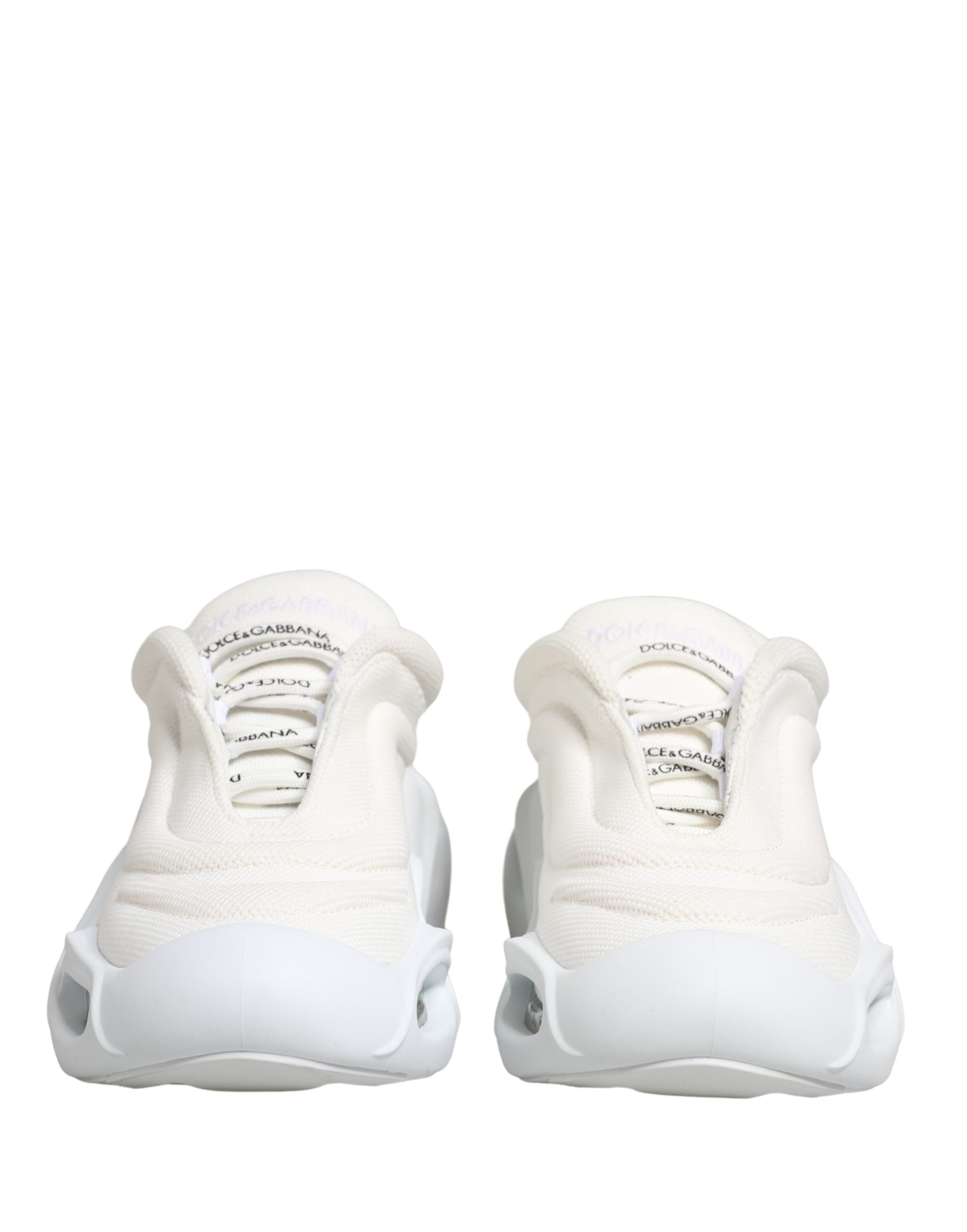 Chaussures basses blanches Dolce & Gabbana Slip-On Wave pour femmes, design élégant et confort moderne.