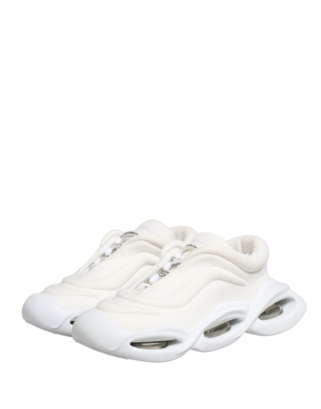 Chaussures Dolce & Gabbana blanches, sneakers basses à enfiler avec motif wave, en cuir pour femme.