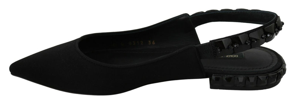Chaussures plates Dolce & Gabbana en charmeuse noire avec bride arrière, élégantes et confortables.