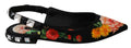 Chaussures Dolce & Gabbana slingbacks noires avec fleurs en cristal, semelles plates élégantes, vue de face.